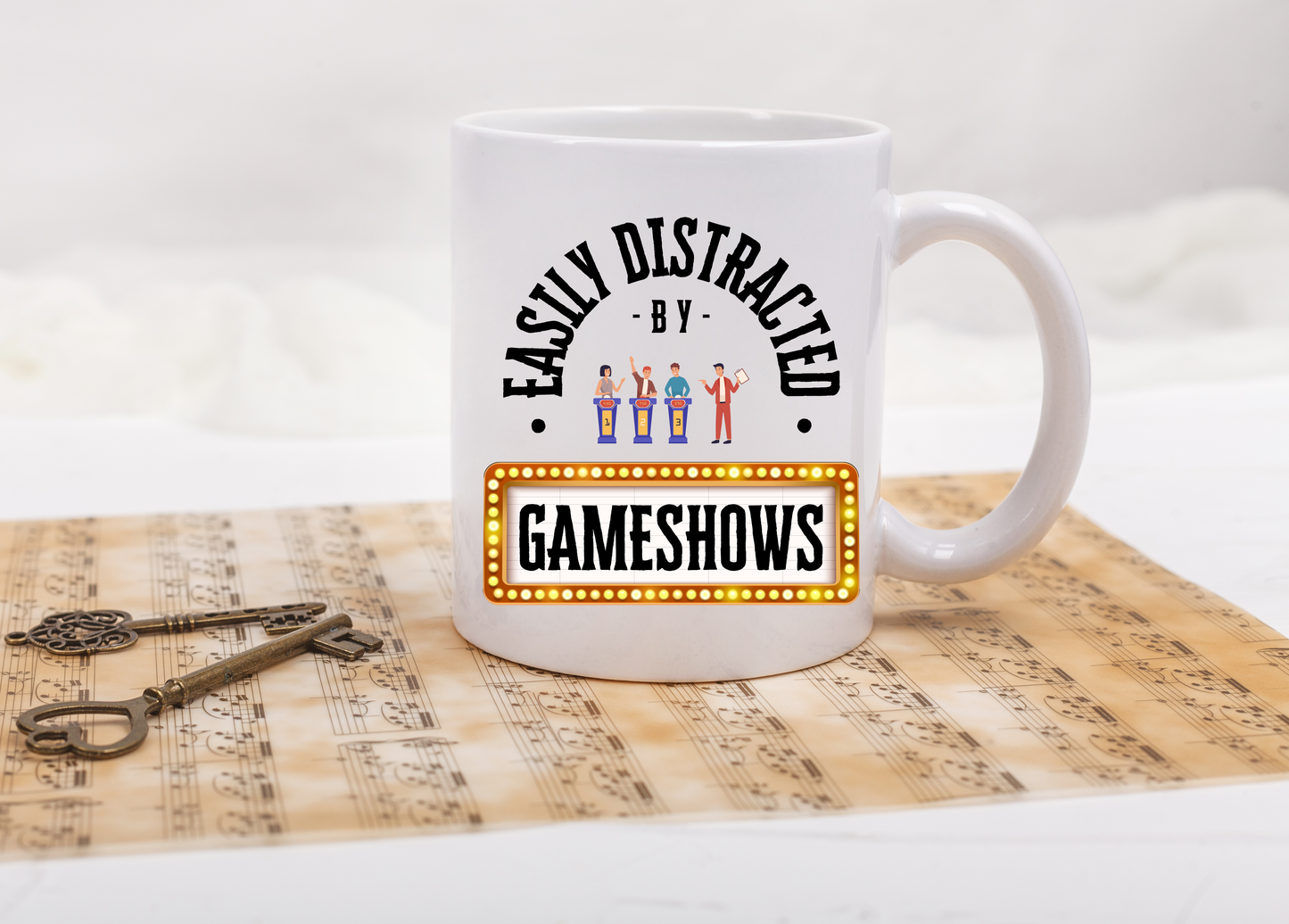 Funny Senior Coffee Mug ‘Easily Distracted By Gameshows’ – Sarcastic Senior Merch, Dark Humor Coffee Cup, Perfect Retirement Gift for Seniors, Grandparents, and Aging Legends
