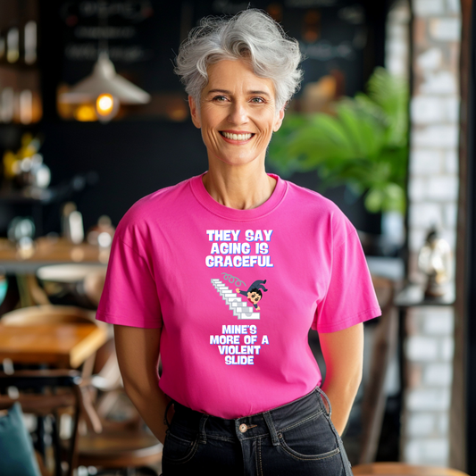 Funny Senior Tee – “They Say Aging Is Graceful, Mine’s More of a Violent Slide” – Sarcastic Senior Merch, Dark Humor Shirt & Funny Aging T-Shirt, Perfect Retirement Gift